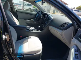 2015 Kia Optima LX z VIN 5XXGM4A76FG507580, wystawiony jako IAAI lot #42544939 z przebiegiem 99 804 mil mil oraz . Historia ofert i sprzedaży dostępna na DreamBid. Obrazek 5.
