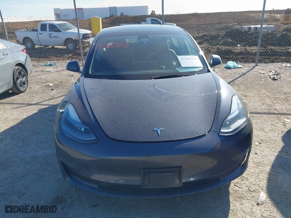 2023 Tesla Model 3 with VIN 5YJ3E1EA3PF678825, listed as a IAAI auction lot 41283153 with 8,607 mi miles. Bid and sale history available at carsss.com. Image 12.