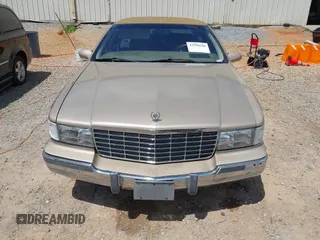 1996 Cadillac Fleetwood z VIN 1G6DW52PXTR705592, wystawiony jako IAAI lot #42290586 z przebiegiem Nie podano mil oraz . Historia ofert i sprzedaży dostępna na DreamBid. Obrazek 6.