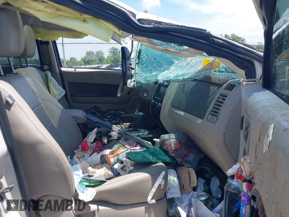 2010 Ford Escape Hybrid with VIN 1FMCU4K35AKB02976, listed as a IAAI auction lot 42691500 with Not provided miles and . Bid and sale history available at DreamBid. Image 5.