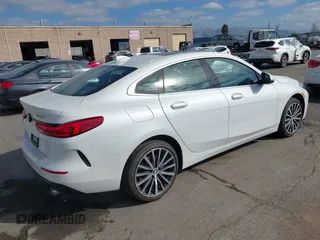 2021 BMW 2 Series 228i with VIN WBA53AK08M7J17741, listed as a IAAI auction lot 41458355 with 31,649 mi miles. Bid and sale history available at carsss.com. Image 4.