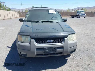 2001 Ford Escape XLT с VIN 1FMYU04161KC37345, выставлен на аукционе IAAI как лот 42312100 с пробегом 225 600 миль миль и . История ставок и продаж доступна на DreamBid. Изображение 6.