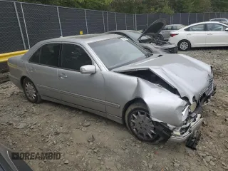 2001 Mercedes-Benz E-Class with VIN WDBJF65J71B201020, listed as a Copart auction lot 76067154 with 328,629 mi miles and Salvage Title. Bid and sale history available at carsss.com. Image 4.