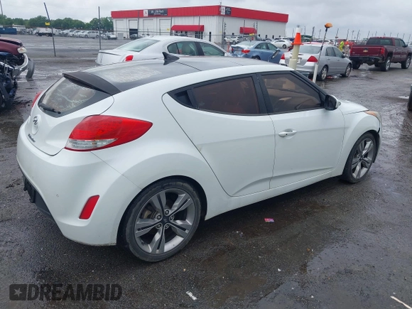 2012 Hyundai Veloster w/Gray Int с VIN KMHTC6ADXCU074298, выставлен на аукционе IAAI как лот 42353923 с пробегом 129 114 миль миль и . История ставок и продаж доступна на DreamBid. Изображение 4.