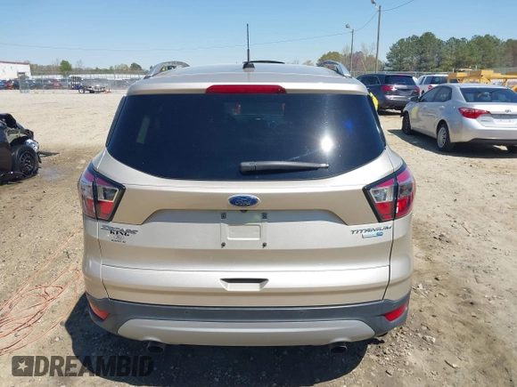 2017 Ford Escape Titanium with VIN 1FMCU9JD3HUC90273, listed as a IAAI auction lot 41828236 with 71,351 mi miles. Bid and sale history available at carsss.com. Image 15.