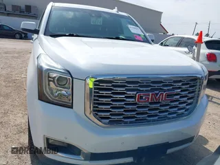 2019 GMC Yukon XL Denali with VIN 1GKS1HKJ8KR378385, listed as a IAAI auction lot 41580041 with 115,481 mi miles. Bid and sale history available at carsss.com. Image 12.