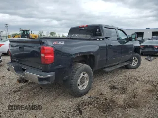 2015 Chevrolet Silverado 3500HD LT z VIN 1GC4KZCG5FF671954, wystawiony jako Copart lot #56741195 z przebiegiem Nie podano mil oraz Szkody całkowita. Historia ofert i sprzedaży dostępna na DreamBid. Obrazek 3.