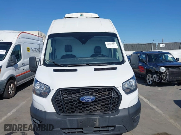 2022 Ford Transit Cargo z VIN 1FTBW3X83NKA36099, wystawiony jako IAAI lot #41966836 z przebiegiem 116 881 mil mil oraz . Historia ofert i sprzedaży dostępna na DreamBid. Obrazek 12.