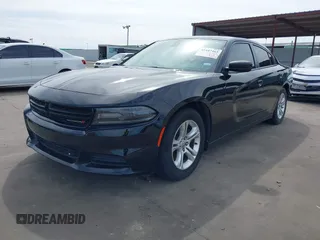 2019 Dodge Charger SXT with VIN 2C3CDXBGXKH691965, listed as a IAAI auction lot 41647463 with 158,529 mi miles and . Bid and sale history available at DreamBid. Image 2.