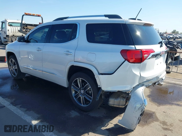 2019 GMC Acadia Denali with VIN 1GKKNPLS9KZ166469, listed as a IAAI auction lot 41857034 with 53,721 mi miles and . Bid and sale history available at carsss.com. Image 3.