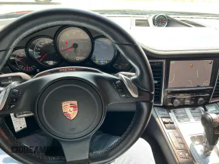 2011 Porsche Panamera S z VIN WP0AB2A79BL062682, wystawiony jako Copart lot #59931365 z przebiegiem 140 499 mil mil oraz Czysty tytuł • Clean title. Historia ofert i sprzedaży dostępna na DreamBid. Obrazek 7.