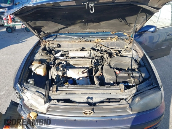 1994 Toyota Camry LE with VIN 4T1SK12EXRU374215, listed as a IAAI auction lot 41581093 with 80,397 mi miles. Bid and sale history available at carsss.com. Image 10.