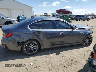 2021 BMW 3 Series 330i xDrive with VIN WBA5R7C04MFK51040, listed as a Copart auction lot 49620045 with 51,069 mi miles and Salvage Title. Bid and sale history available at carsss.com. Image 3.