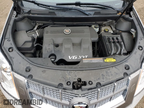 2012 Cadillac SRX Performance Collection z VIN 3GYFNBE35CS536105, wystawiony jako Copart lot #57588275 z przebiegiem 96 359 mil mil oraz Szkoda całkowita • Salvage title. Historia ofert i sprzedaży dostępna na DreamBid. Obrazek 11.