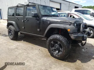 2013 Jeep Wrangler Unlimited Rubicon 10th Anniversary with VIN 1C4HJWFGXDL543660, listed as a Copart auction lot 61462104 with 115,897 mi miles and Salvage title. Bid and sale history available at DreamBid. Image 4.