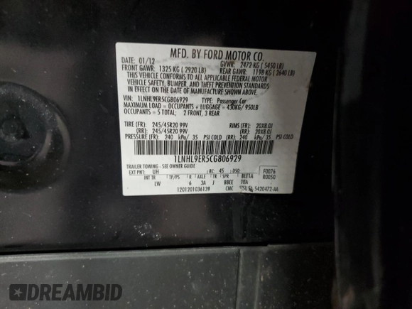 2012 Lincoln MKS z VIN 1LNHL9ER5CG806929, wystawiony jako Copart lot #85328514 z przebiegiem 155 015 mil mil oraz Szkoda całkowita • Salvage title. Historia ofert i sprzedaży dostępna na DreamBid. Obrazek 13.