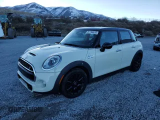 2015 MINI Cooper Hardtop 4 Door S with VIN WMWXU3C59F2B56613, listed as a Copart auction lot 87768635 with 106,228 mi miles and Salvage Title. Bid and sale history available at carsss.com. Image 1.