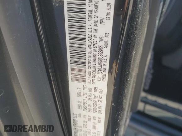 2013 Jeep Wrangler Sahara with VIN 1C4AJWBG8DL602065, listed as a Copart auction lot 52082535 with 110,727 mi miles and Salvage title. Bid and sale history available at DreamBid. Image 12.