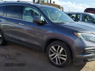 2017 Honda Pilot Touring with VIN 5FNYF6H98HB016757, listed as a Copart auction lot 45879755 with 85,580 mi miles and Salvage Title. Bid and sale history available at DreamBid. Image 4.