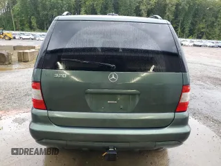 2002 Mercedes-Benz M-Class with VIN 4JGAB54EX2A313793, listed as a Copart auction lot 72600614 with 140,053 mi miles and Salvage Title. Bid and sale history available at carsss.com. Image 6.
