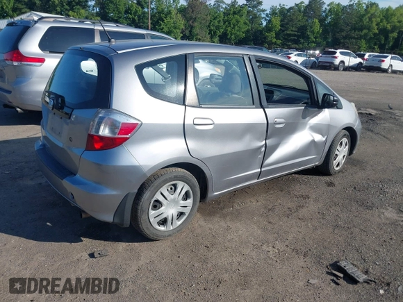 2009 Honda Fit z VIN JHMGE88289C002965, wystawiony jako IAAI lot #42382336 z przebiegiem 120 727 mil mil oraz . Historia ofert i sprzedaży dostępna na DreamBid. Obrazek 4.