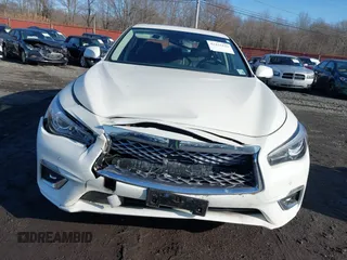 2023 Infiniti Q50 Luxe z VIN JN1EV7BR8PM540570, wystawiony jako IAAI lot #41131629 z przebiegiem 5 964 mil mil oraz . Historia ofert i sprzedaży dostępna na DreamBid. Obrazek 6.