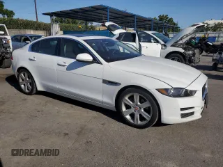 2017 Jaguar XE with VIN SAJAE4BNXHA968653, listed as a Copart auction lot 57039744 with 148,481 mi miles and Salvage Title. Bid and sale history available at DreamBid. Image 4.