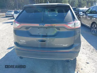 2015 Ford Edge Titanium z VIN 2FMTK3K90FBB13499, wystawiony jako IAAI lot #41492084 z przebiegiem 256 649 mil mil oraz . Historia ofert i sprzedaży dostępna na DreamBid. Obrazek 16.