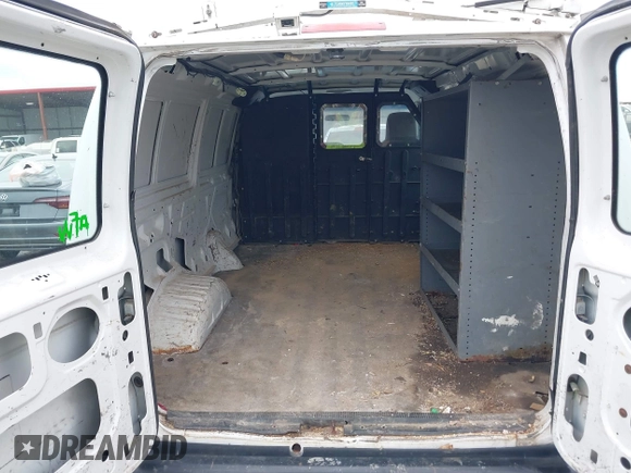 2009 Ford Econoline Cargo Commercial with VIN 1FTNE14W49DA93428, listed as a IAAI auction lot 41641859 with 220,630 mi miles and . Bid and sale history available at DreamBid. Image 18.