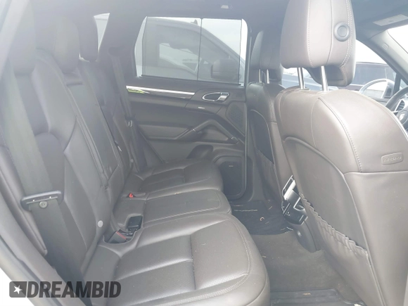 2016 Porsche Cayenne S E-Hybrid with VIN WP1AE2A26GLA59496, listed as a IAAI auction lot 41884022 with 85,386 mi miles and . Bid and sale history available at DreamBid. Image 8.