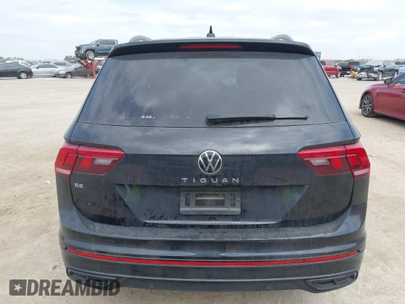 2023 Volkswagen Tiguan SE R-Line Black with VIN 3VVCB7AX0PM122636, listed as a IAAI auction lot 42040494 with 8,589 mi miles and . Bid and sale history available at DreamBid. Image 16.