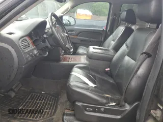 2010 Chevrolet Tahoe LTZ with VIN 1GNUKCE05AR164175, listed as a Copart auction lot 57223295 with 423,010 mi miles and Salvage title. Bid and sale history available at DreamBid. Image 7.