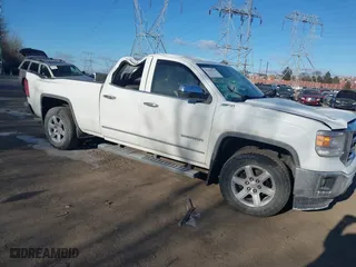 2014 GMC Sierra 1500 SLT with VIN 1GTV2VEC0EZ182222, listed as a IAAI auction lot 41639510 with 87,154 mi miles. Bid and sale history available at carsss.com. Image 1.