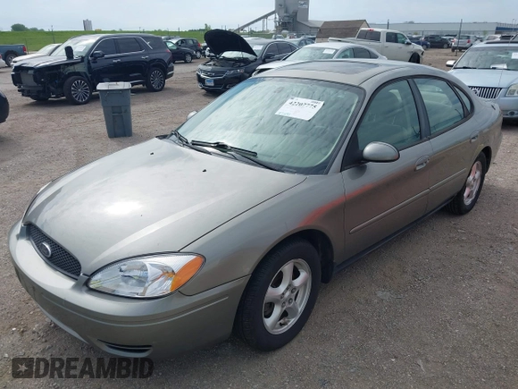 2004 Ford Taurus z VIN 1FAHP55U74G112479, wystawiony jako IAAI lot #42207775 z przebiegiem 97 491 mil mil oraz . Historia ofert i sprzedaży dostępna na DreamBid. Obrazek 2.