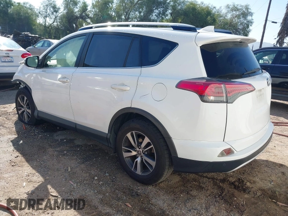 2017 Toyota RAV4 XLE with VIN JTMWFREV9HJ128521, listed as a IAAI auction lot 41658054 with 106,788 mi miles and . Bid and sale history available at DreamBid. Image 3.