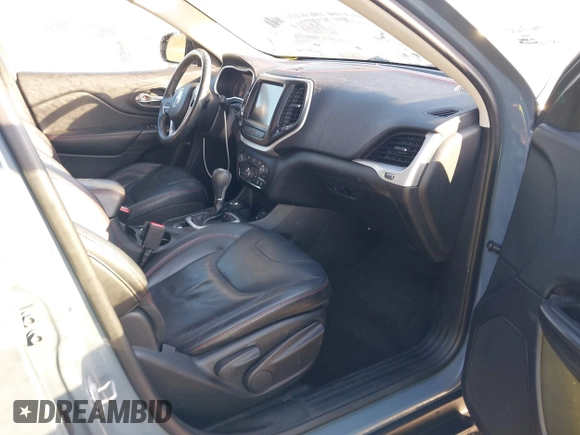 2014 Jeep Cherokee Trailhawk z VIN 1C4PJMBS2EW212341, wystawiony jako IAAI lot #40672694 z przebiegiem 108 622 mil mil oraz . Historia ofert i sprzedaży dostępna na DreamBid. Obrazek 5.
