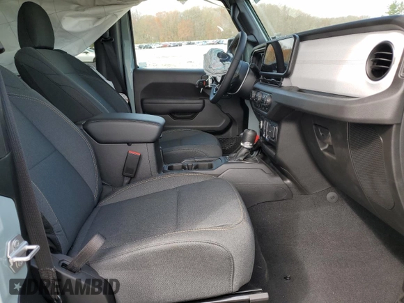 2024 Jeep Wrangler Sport S with VIN 1C4PJXAG2RW335190, listed as a Copart auction lot 51767465 with 2,717 mi miles and Salvage title. Bid and sale history available at DreamBid. Image 11.