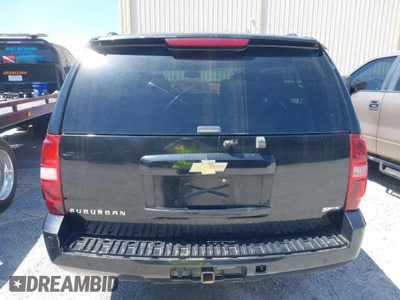 2011 Chevrolet Suburban LT with VIN 1GNSCJE09BR319675, listed as a IAAI auction lot 41966225 with 294,335 mi miles. Bid and sale history available at carsss.com. Image 16.
