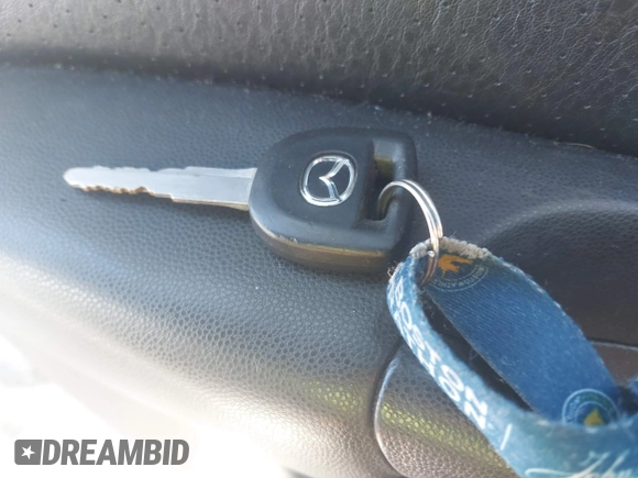 2004 Mazda 3 s with VIN JM1BK323841120740, listed as a IAAI auction lot 41623857 with 149,166 mi miles and . Bid and sale history available at DreamBid. Image 11.