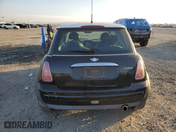 2004 MINI Hardtop with VIN WMWRC33484TJ59008, listed as a Copart auction lot 46003105 with 83,303 mi miles and Salvage Title. Bid and sale history available at DreamBid. Image 6.