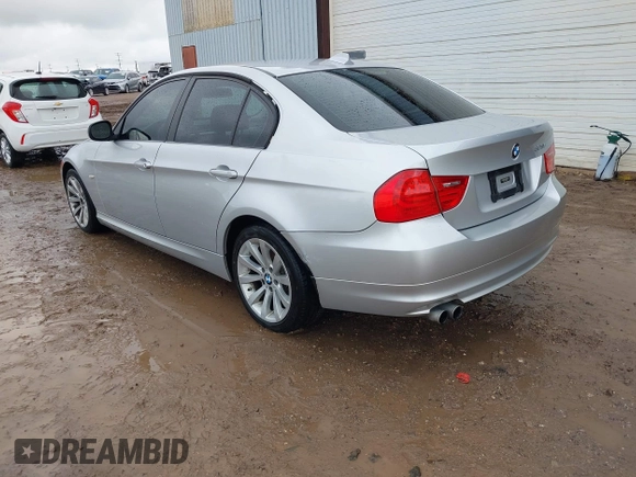 2011 BMW 3 Series 328i with VIN WBAPH7C57BA801980, listed as a IAAI auction lot 42100423 with 130,048 mi miles and . Bid and sale history available at DreamBid. Image 3.