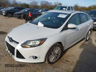 2013 Ford Focus Titanium with VIN 1FADP3J22DL167324, listed as a IAAI auction lot 41616927 with 127,259 mi miles and . Bid and sale history available at carsss.com. Image 2.