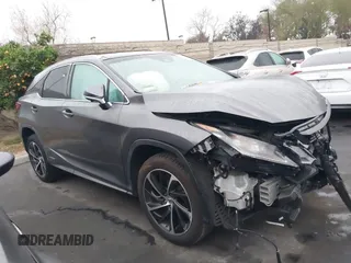 2017 Lexus RX 450h with VIN 2T2BGMCA8HC013446, listed as a IAAI auction lot 41848933 with 59,431 mi miles and . Bid and sale history available at DreamBid. Image 14.
