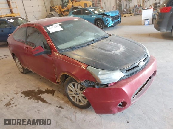 2009 Ford Focus SE with VIN 1FAHP32N49W222419, listed as a IAAI auction lot 42113655 with 238,936 mi miles. Bid and sale history available at carsss.com. Image 1.