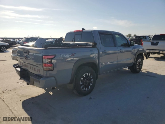2022 Nissan Frontier PRO-X with VIN 1N6ED1EJ4NN647123, listed as a Copart auction lot 86296104 with 80,822 mi miles and Salvage Title. Bid and sale history available at carsss.com. Image 3.