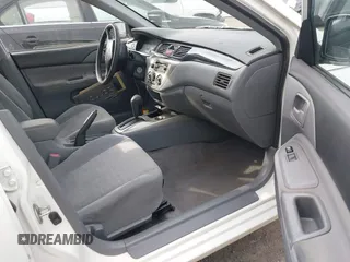 2004 Mitsubishi Lancer ES with VIN JA3AJ26E74U060371, listed as a IAAI auction lot 41636927 with 165,456 mi miles. Bid and sale history available at carsss.com. Image 5.