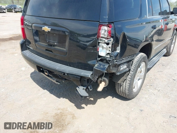 2015 Chevrolet Tahoe LT with VIN 1GNSCBKC9FR679748, listed as a IAAI auction lot 42018017 with 224,264 mi miles and . Bid and sale history available at DreamBid. Image 6.