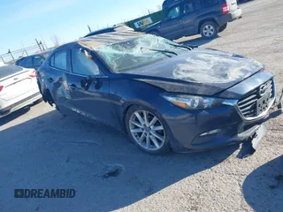 2017 Mazda 3 Touring z VIN JM1BN1V72H1118627, wystawiony jako IAAI lot #41419156 z przebiegiem Nie podano mil oraz . Historia ofert i sprzedaży dostępna na DreamBid. Obrazek 1.