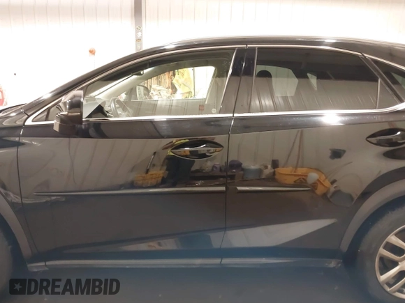 2015 Lexus NX 200t with VIN JTJBARBZ1F2004476, listed as a IAAI auction lot 41668982 with 110,512 mi miles and . Bid and sale history available at DreamBid. Image 14.