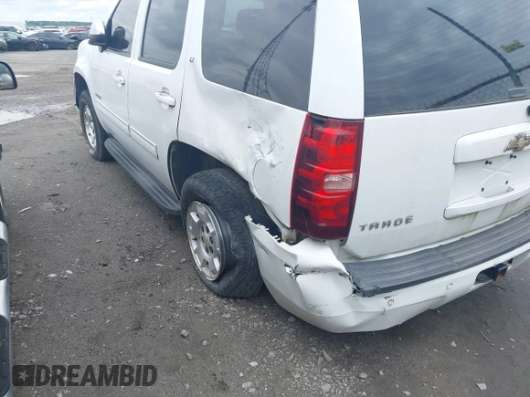 2011 Chevrolet Tahoe LT with VIN 1GNSCBE01BR146546, listed as a IAAI auction lot 39196597 with 206,906 mi miles and . Bid and sale history available at DreamBid. Image 6.